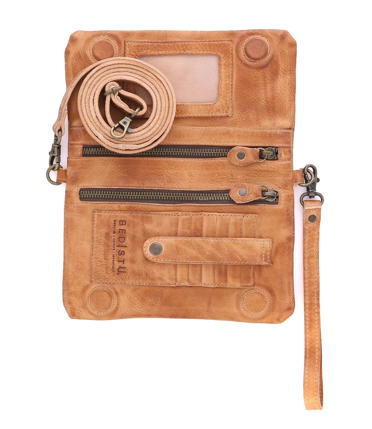 Inside a Cadence tan leather clutch bag by Bed Stu.