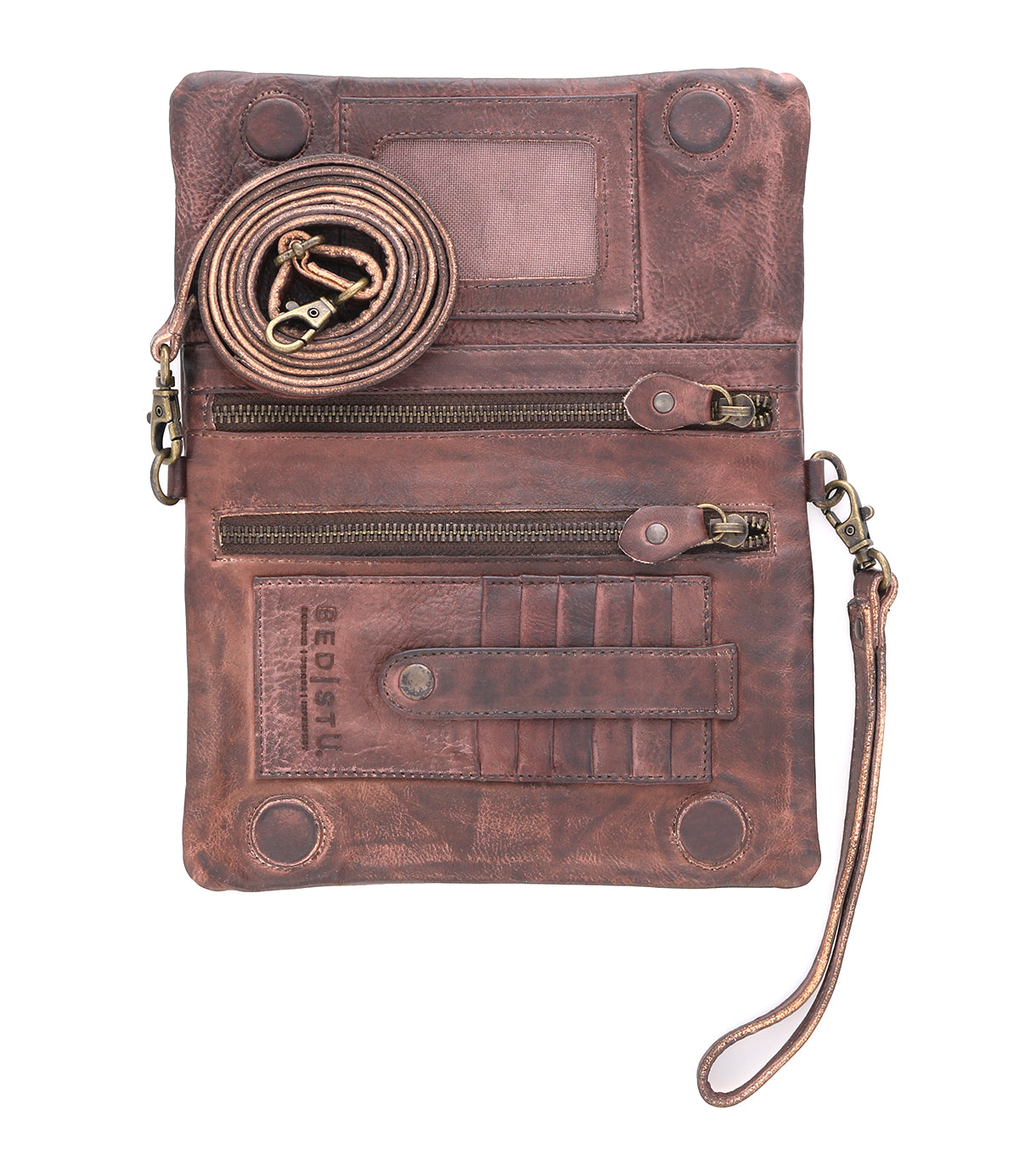 Inside a Cadence teak leather clutch bag by Bed Stu.