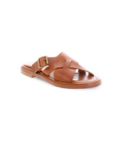 A brown slip on Italian leather sandal with a gold buckle product shot. 