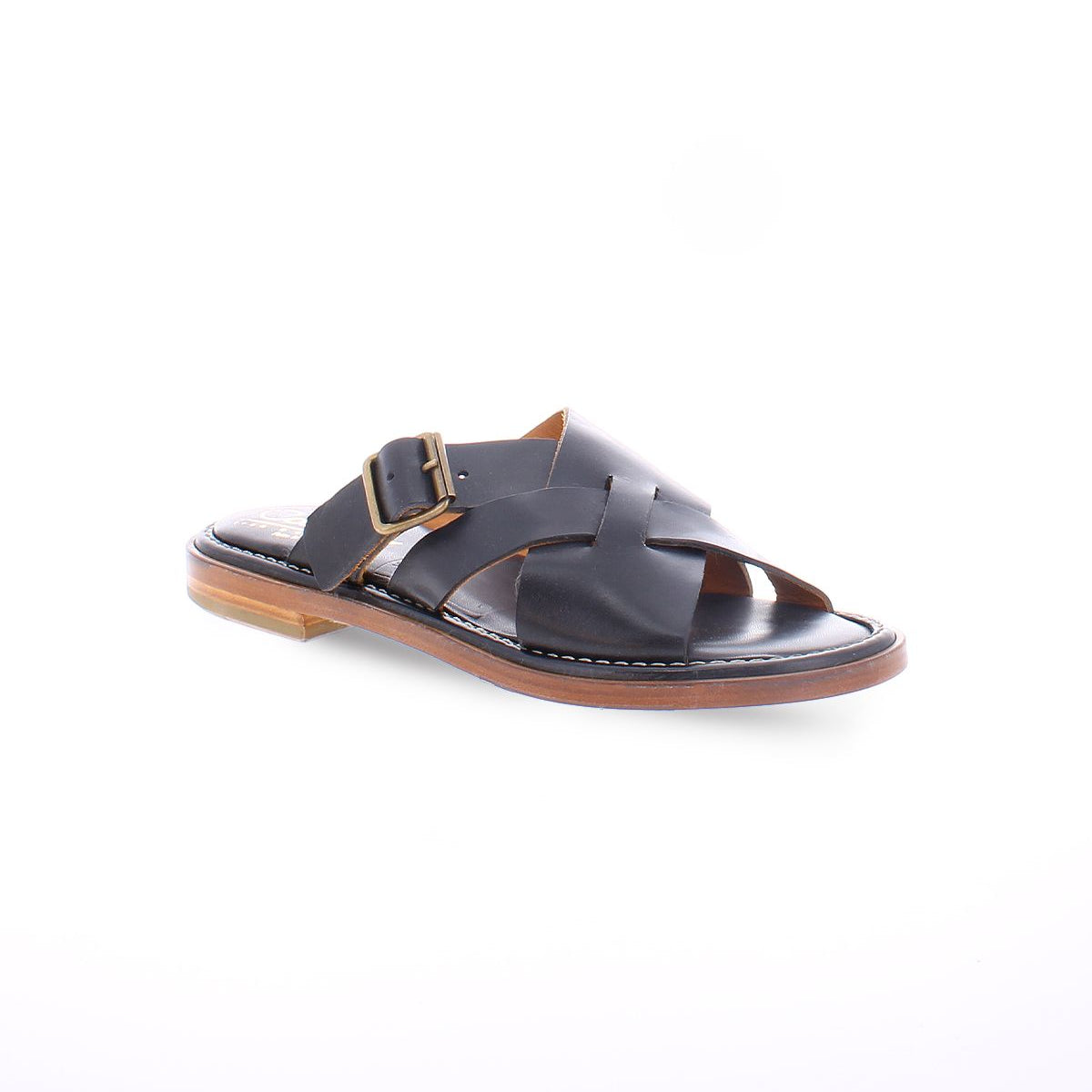 A black slip on Italian leather sandal with a gold buckle product shot.