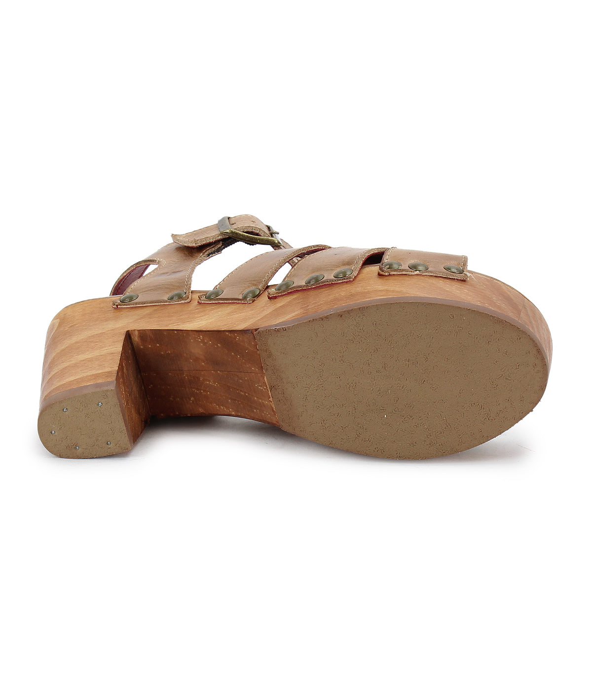The Bed Stu Caitlin II features a wooden heel, a textured sole for grip, and metal rivets securing the leather straps, with visible stud accents viewed from the bottom.