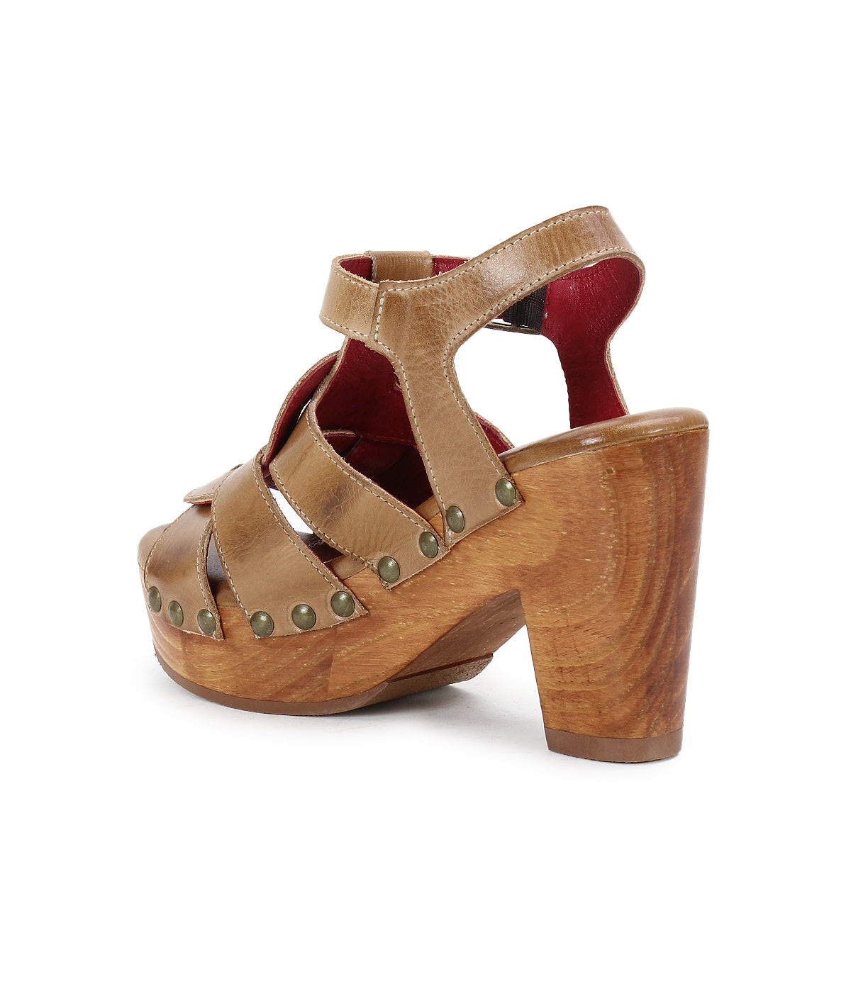 The Bed Stu Caitlin II is a brown high-heeled sandal with woven leather straps, chic stud details, and a wooden platform and heel.