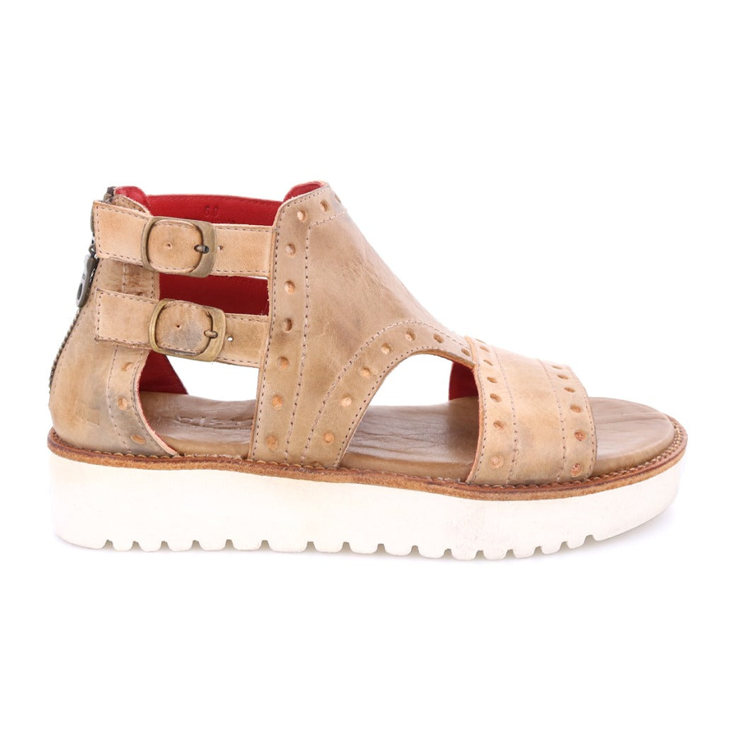 A women's Camden sandal by Bed Stu with two straps and a white sole.