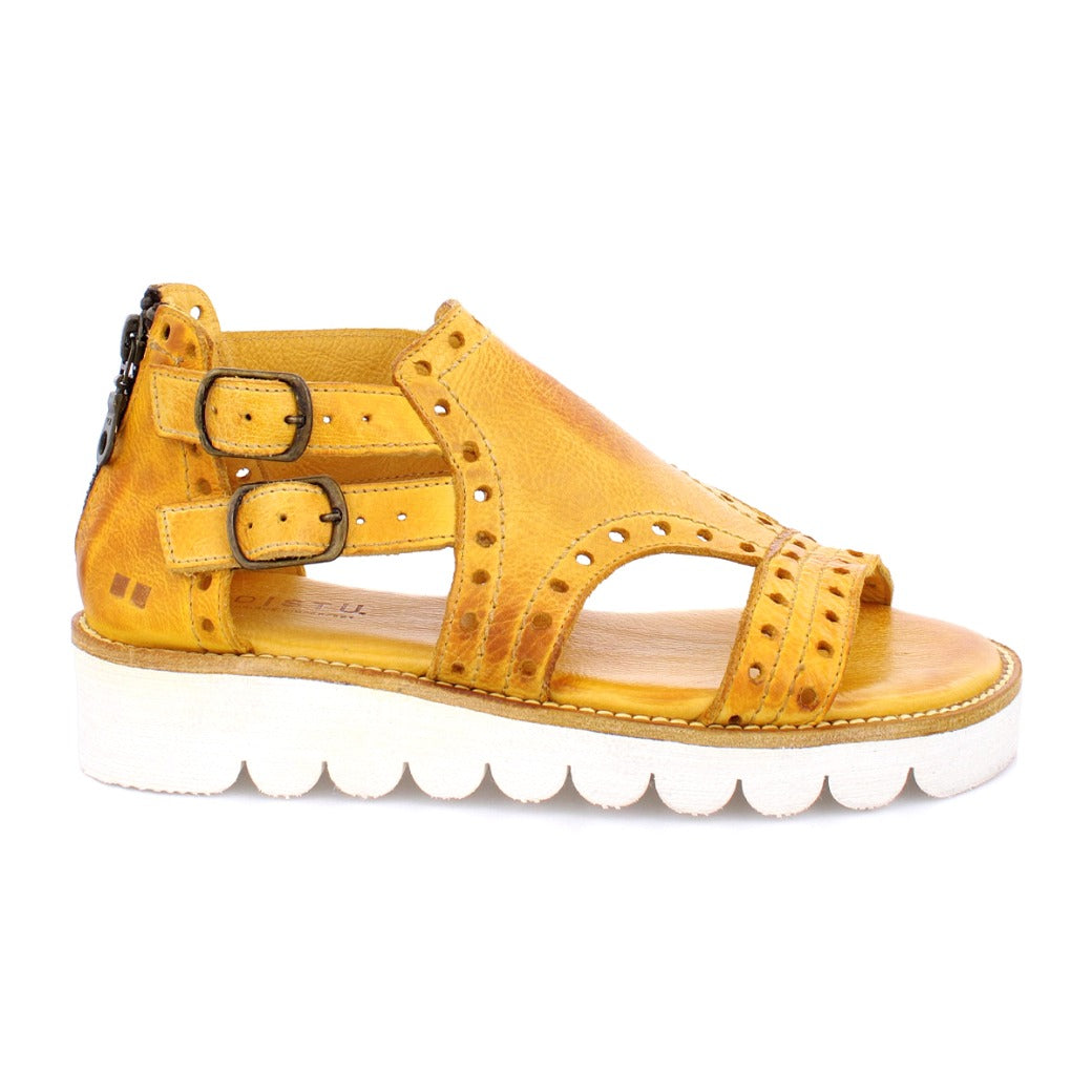 A women's yellow Camden sandal with buckles and a white sole by Bed Stu.