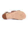 A pair of Bed Stu Capriana women's tan sandals on a white background.