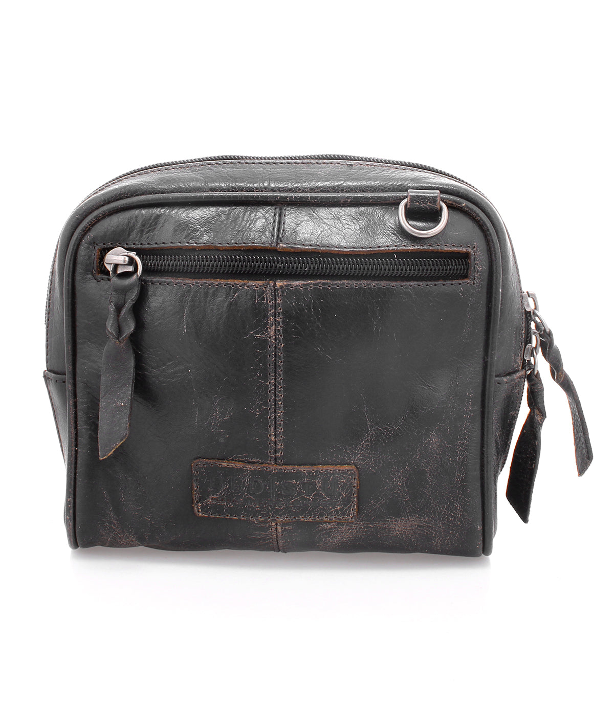 A handcrafted black leather Capture cosmetic bag with a zipper by Bed Stu.
