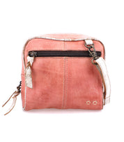 A Capture pink leather cross body bag with a zipper from Bed Stu.