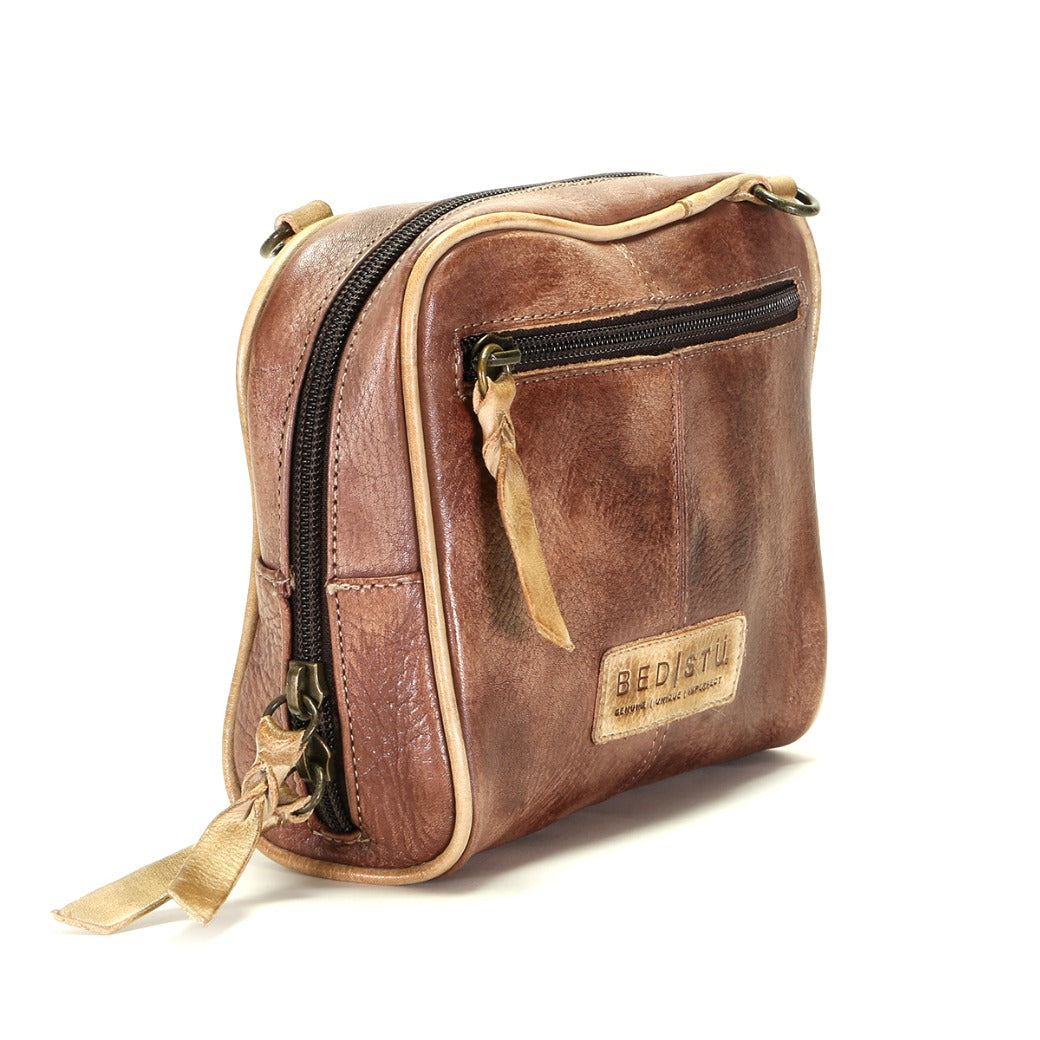 A Capture brown leather cross body bag with a zipper from Bed Stu.