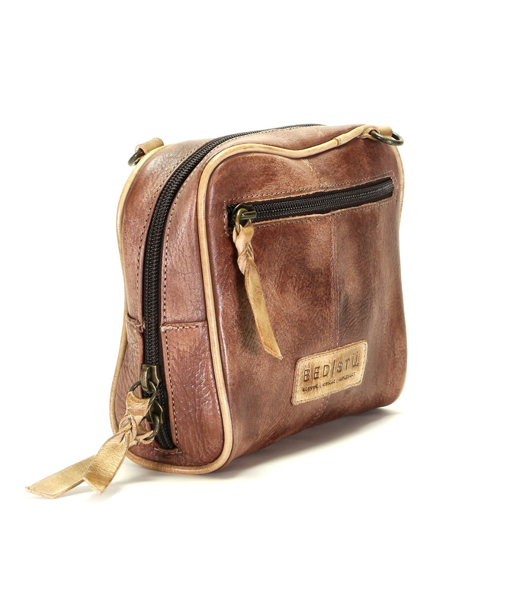 A Capture brown leather cross body bag with a zipper from Bed Stu.