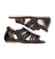 A pair of black Cara gladiator sandals with straps by Bed Stu.