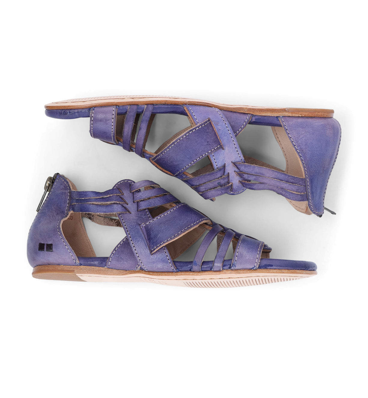 A pair of blue Bed Stu Cara sandals with straps and buckles.