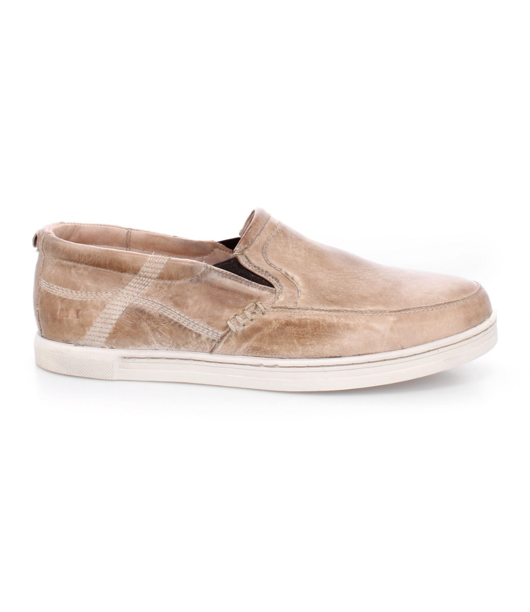 A men's tan slip on Bed Stu Carp shoe.