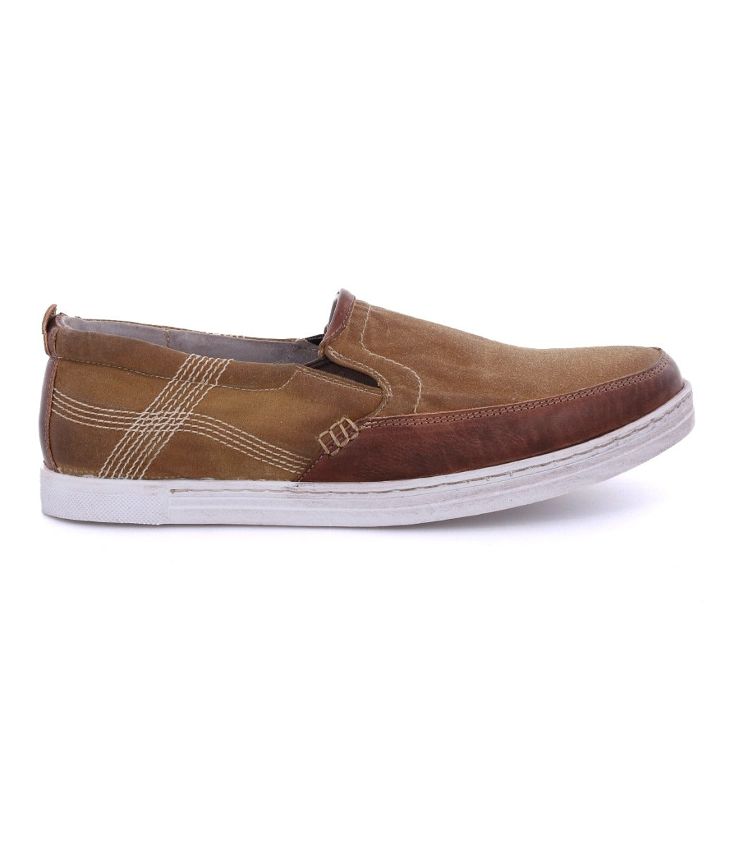 A pair of Carp men's slip on shoes in tan and brown by Bed Stu.