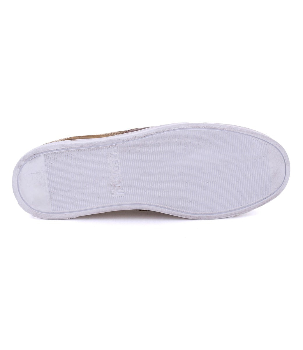 A pair of Carp shoes with white soles on a white background by Bed Stu.