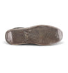 A close up of a Bed Stu Carp shoe with a black sole.