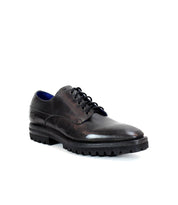 The Carter by Bed Stu is a single derby shoe made from vegetable-tanned leather, complete with black laces and a durable sole constructed with Goodyear welt technology.