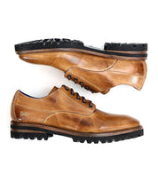 The Carter by Bed Stu is a pair of men's oxford dress shoes made from vegetable-tanned leather, complete with black rubber soles and five eyelets each for lacing. The classic design is enhanced by the durability of Goodyear welt construction.