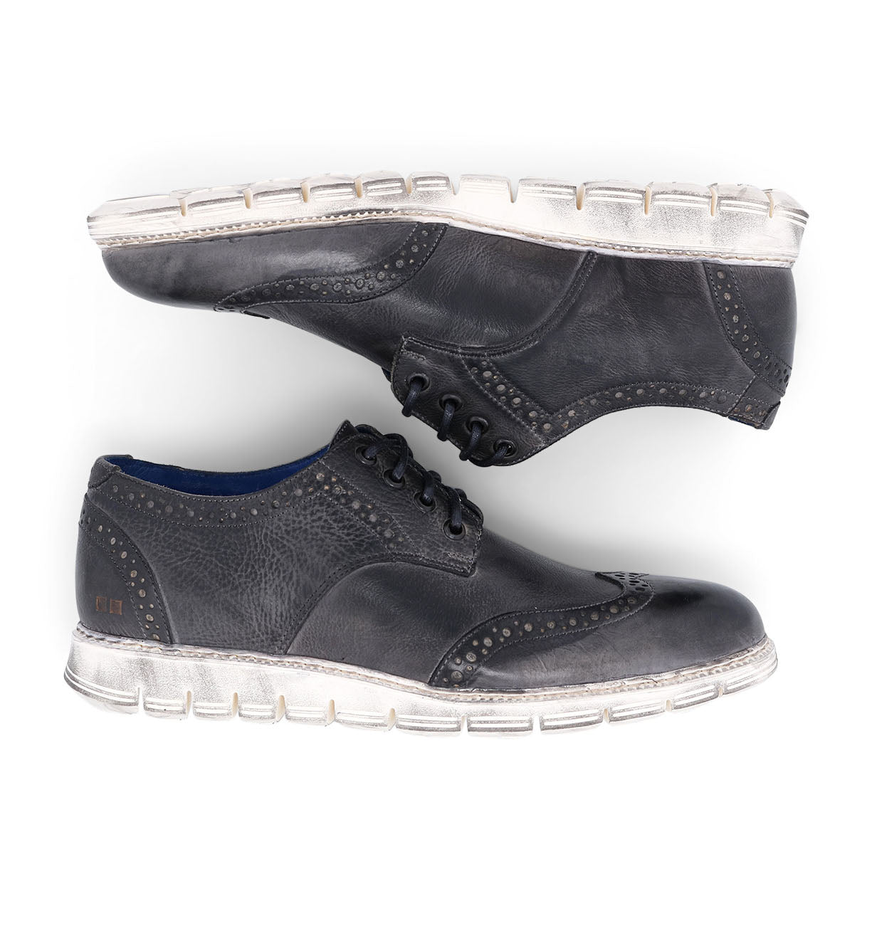 A pair of Bed Stu Cayuga II wingtip shoes on a white background.