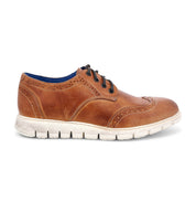 A men's tan wingtip lace up Cayuga II shoe by Bed Stu.