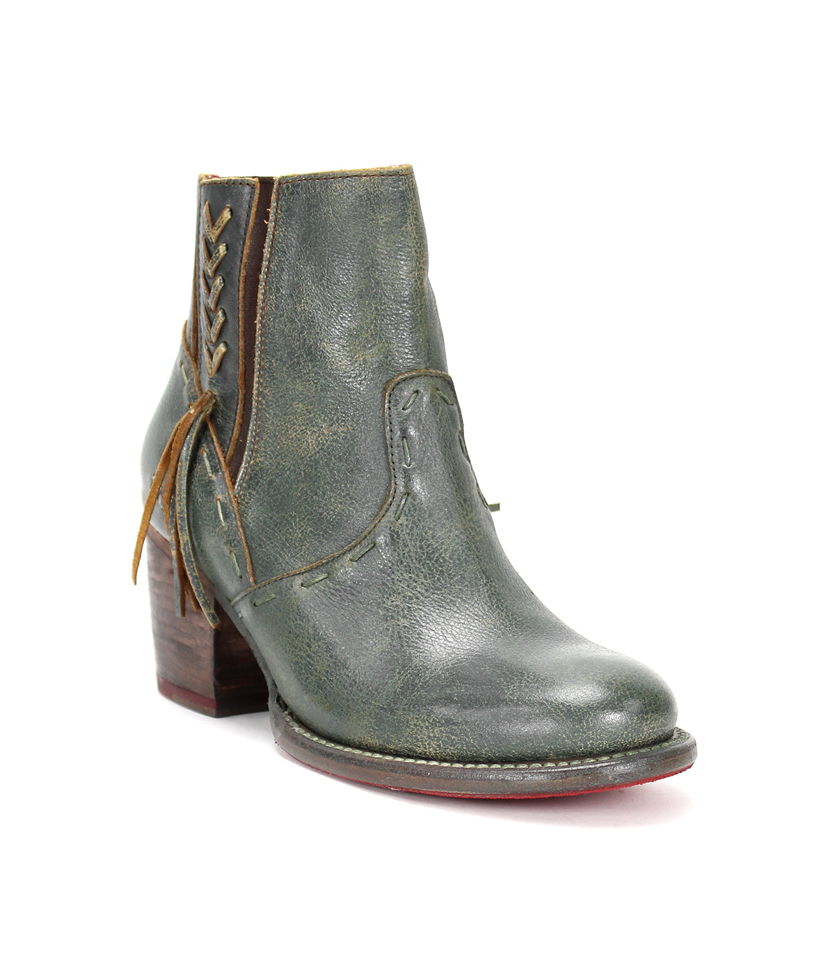 A women's green leather ankle boot with a wooden heel named Celestine by Bed Stu.