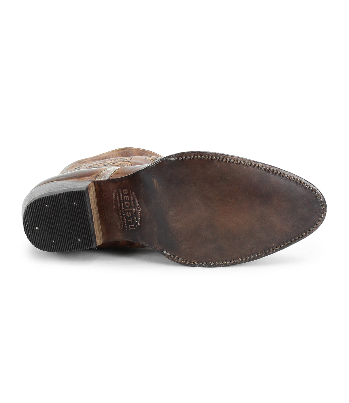 The Chamise by Bed Stu is a brown leather dress shoe shown from the bottom, featuring a stitched sole with a slightly worn look akin to a classic leather boot.