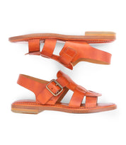 A brown fisherman Italian leather sandal with a gold buckle product shot.