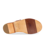 A brown fisherman Italian leather sandal with a gold buckle sole product shot.