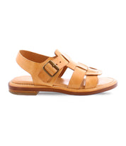 A Italian made sandal is natural color with fisherman style