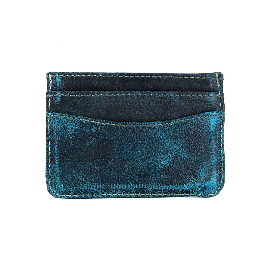 The Chuck by Bed Stu, a weathered blue leather card wallet featuring multiple slots for cards, is displayed against a white background. Compact and convenient, it's designed to keep your essentials organized effortlessly.