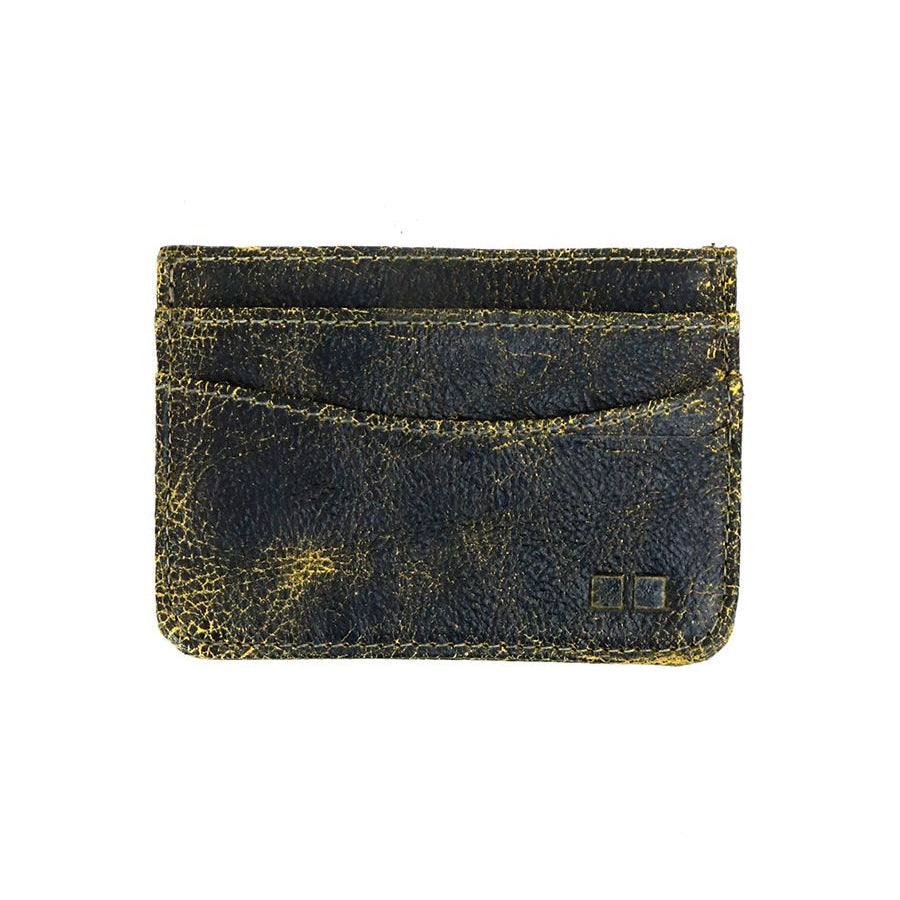 The Chuck by Bed Stu is a small, rustic brown leather cardholder with three slots and visible wear, offering both style and convenience in a compact design.