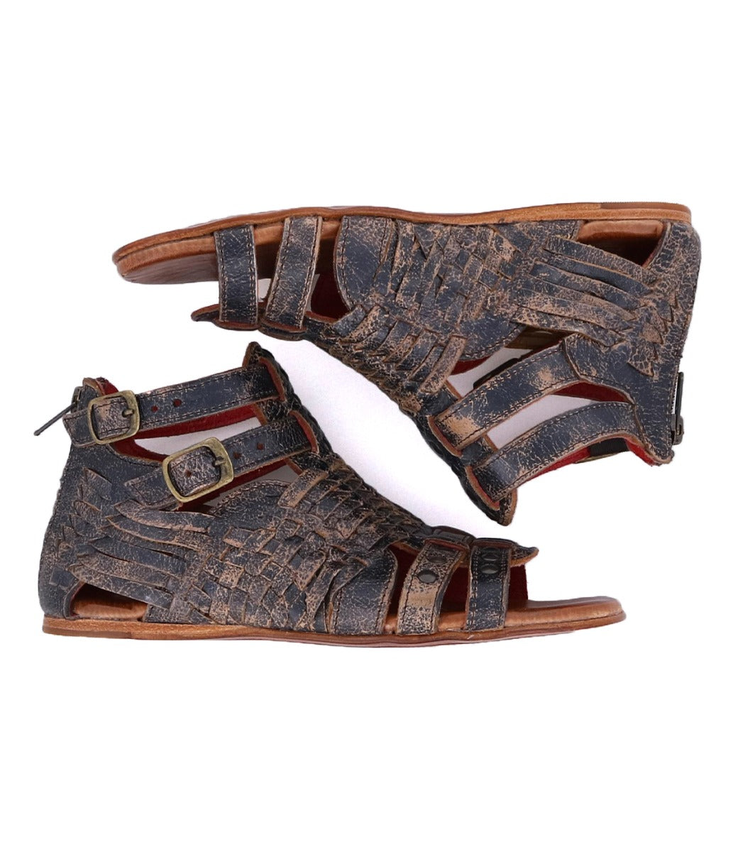 A pair of brown Bed Stu Claire III gladiator sandals with straps and buckles.
