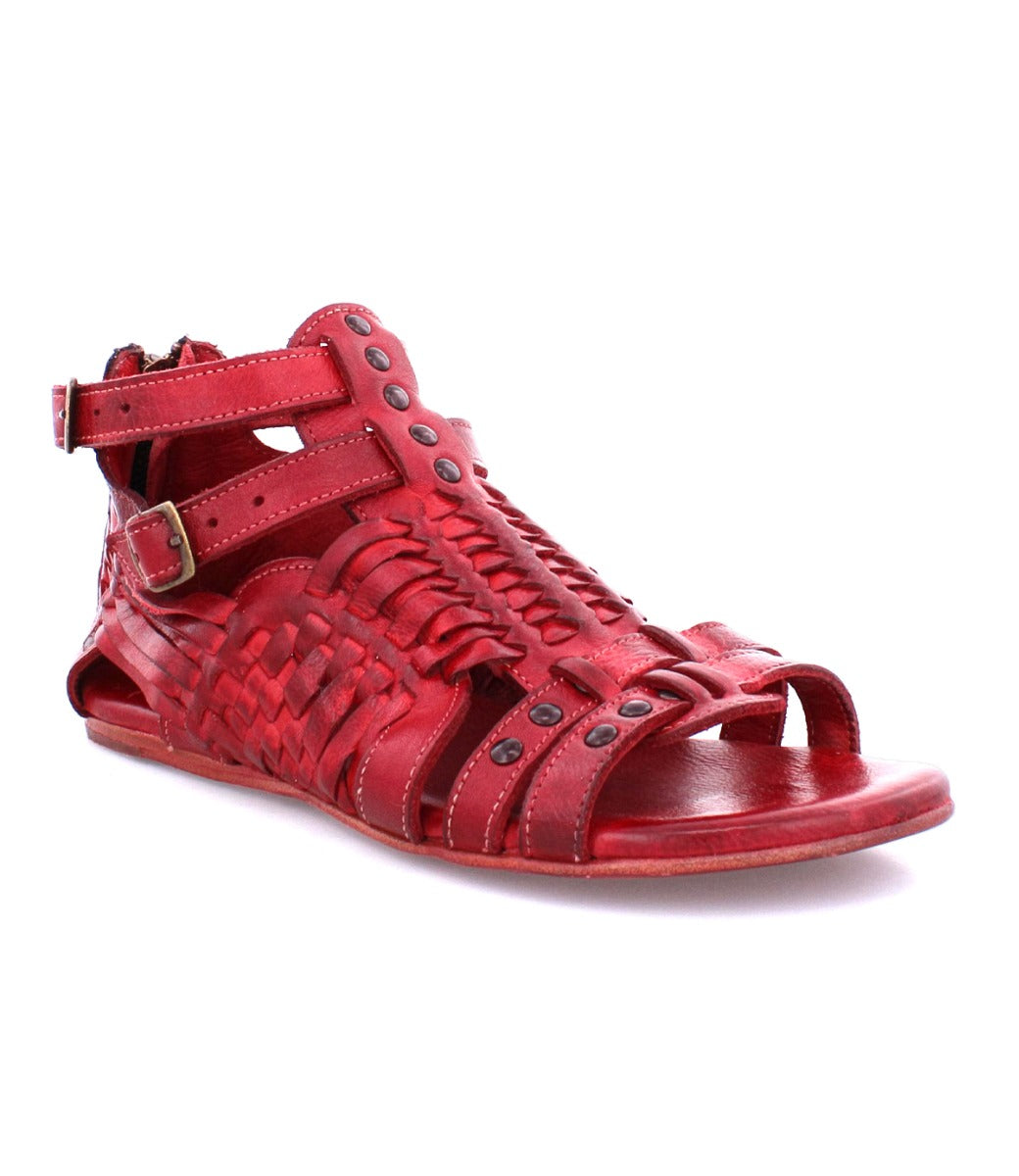 A pair of Bed Stu Claire III red sandals with braided straps.