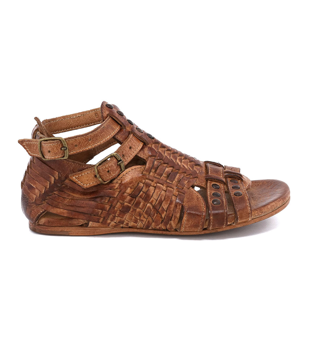 A pair of brown Claire sandals with straps and buckles from Bed Stu.