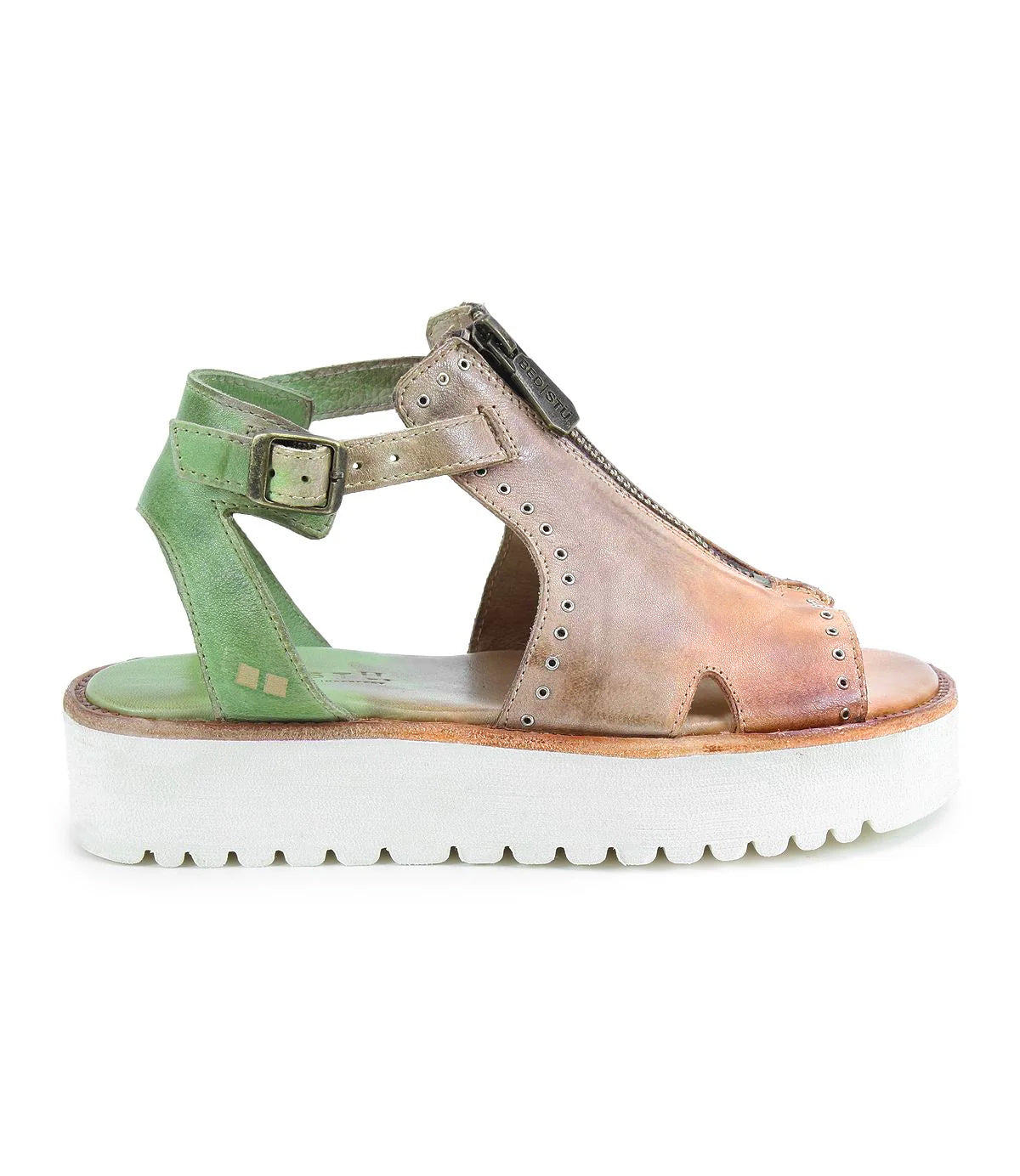 The Clancy sandal by Bed Stu features an XL EXTRALIGHT platform sole, a vibrant mix of green and brown tones, adjustable ankle straps, metal grommets, a front zipper, and a cushioned insole for comfort.