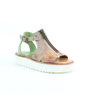 The Clancy sandal by Bed Stu features brown leather with a zipper front, ankle strap, buckle closure, and an XL EXTRALIGHT platform. Finished with a thick white sole, it offers comfort and style in every step.