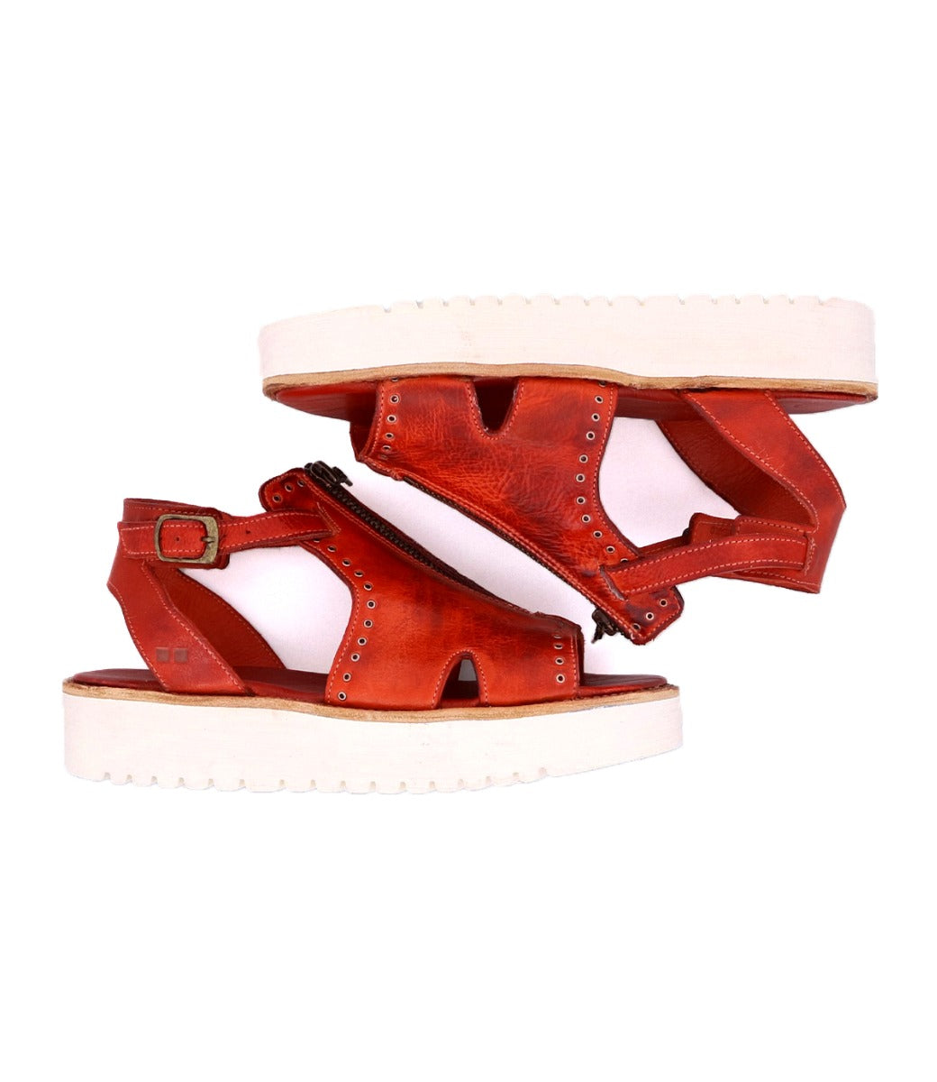 A pair of Clancy red sandals with white soles from Bed Stu.