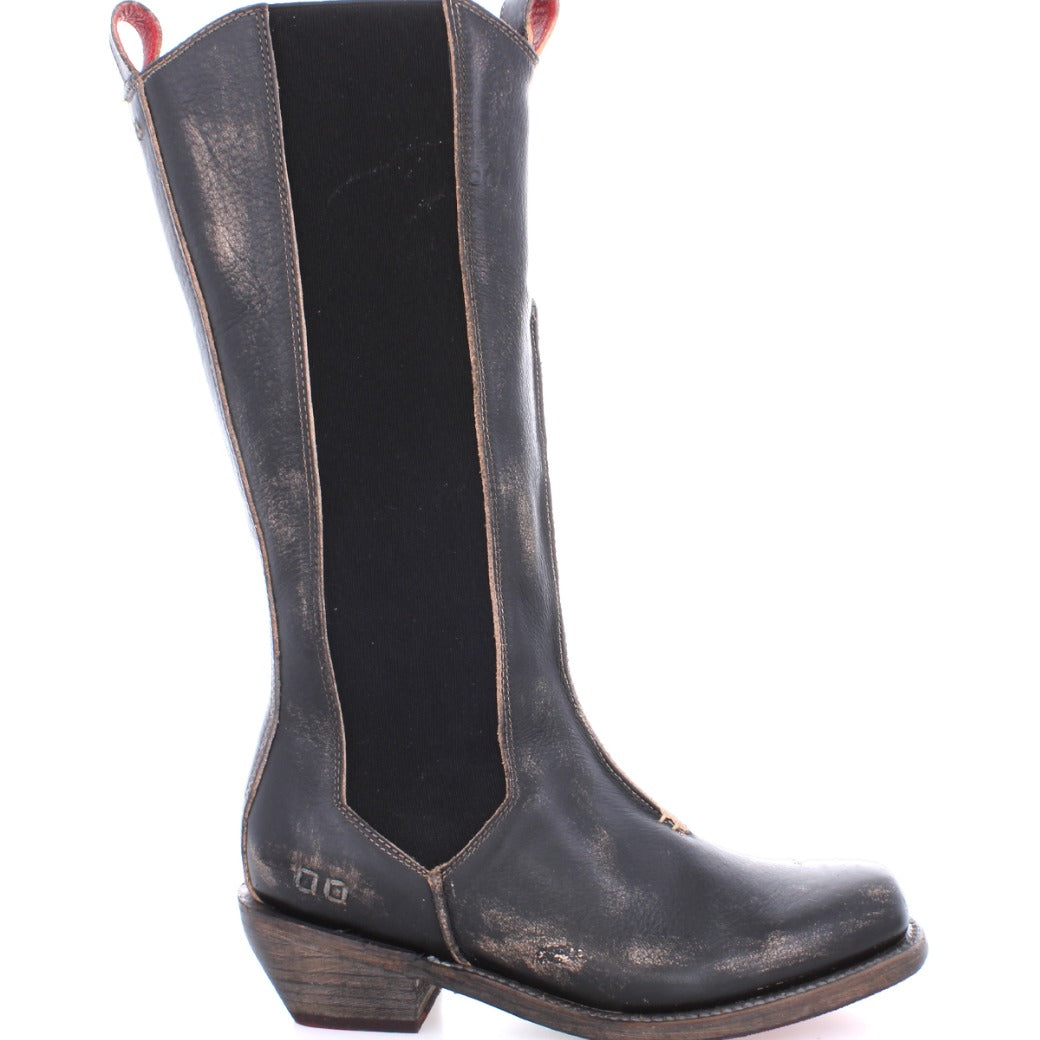 A women's Clarisse cowboy boot by Bed Stu with a red sole.