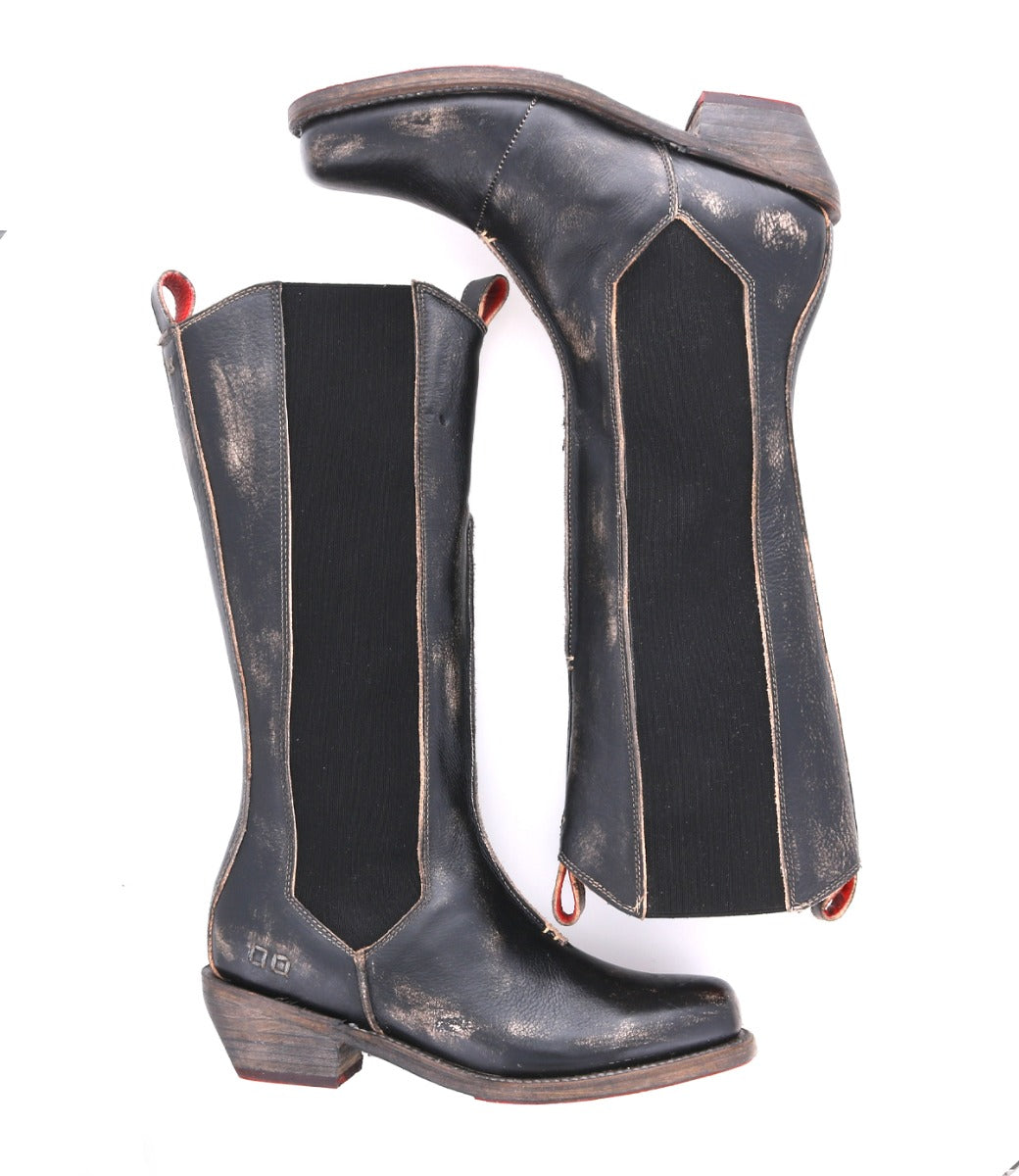 A pair of Clarisse boots on a white background, made by Bed Stu.