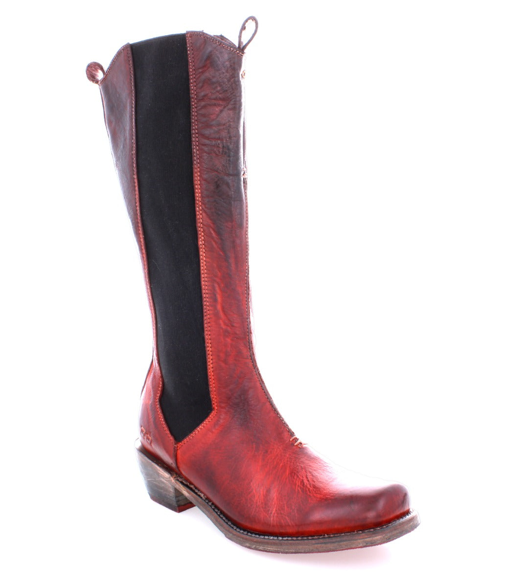 A Clarisse red leather boot with black soles. (Brand: Bed Stu)