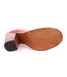A Clavel shoe with a wooden sole.