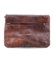 A Cleo by Bed Stu brown leather crossbody bag with a zipper top closure.