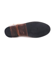 A pair of Bed Stu Clyde brown shoes with black soles.