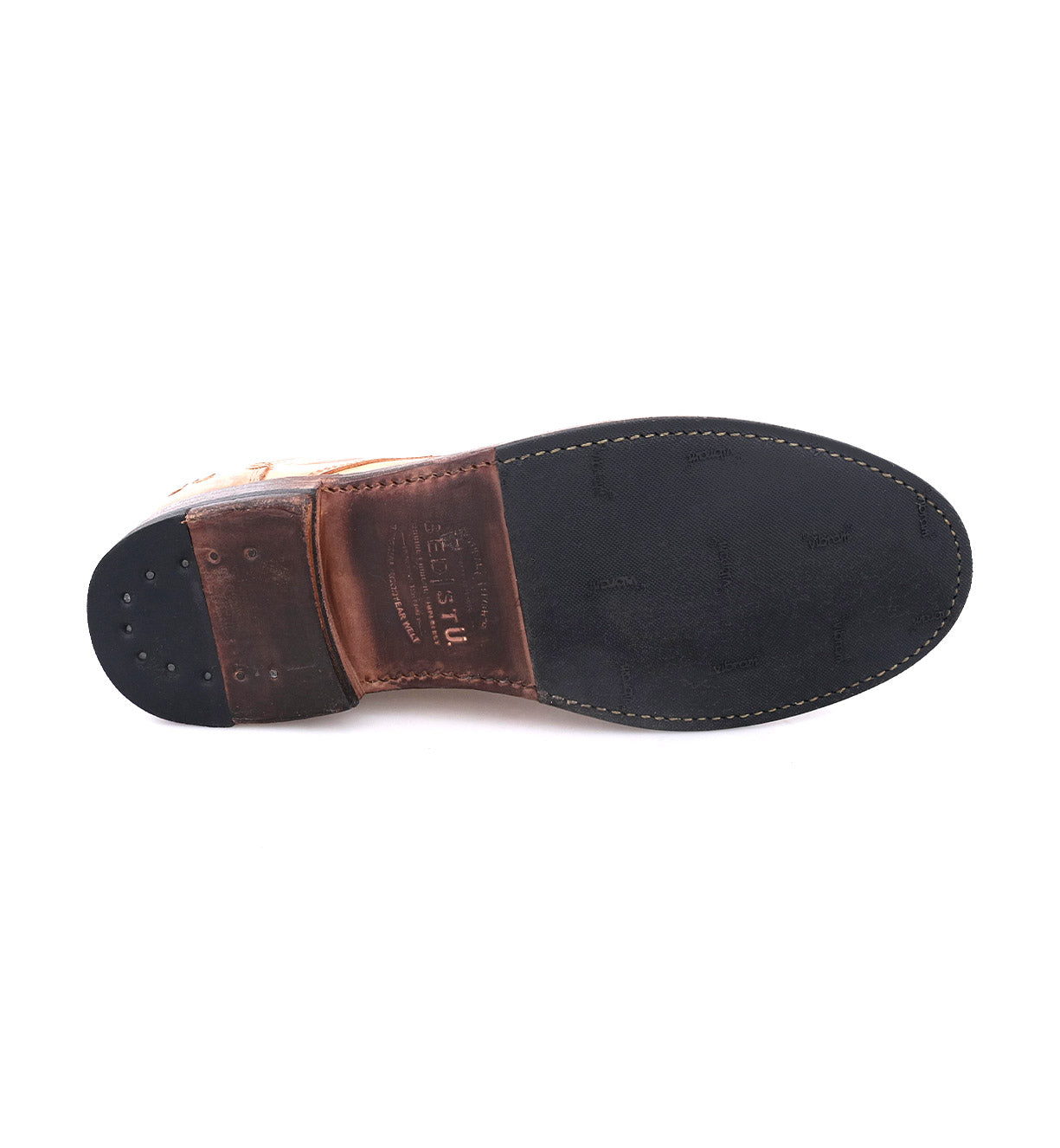 A pair of Bed Stu Clyde brown shoes with black soles.