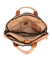 A stylish laptop bag made of vegetable-tanned leather, perfect for carrying work essentials, called the Conclusion by Bed Stu.