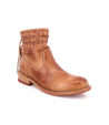 A women's tan Craven ankle boot with braided detailing by Bed Stu.