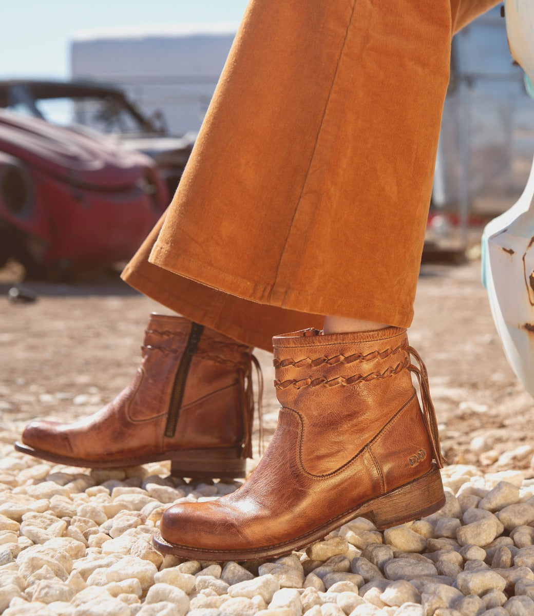 A woman wearing Craven boots by Bed Stu.