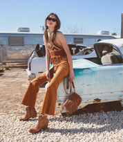 A woman wearing Craven boots by Bed Stu.