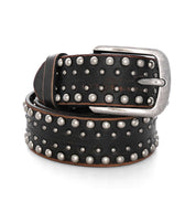 The Bed|Stü Cristal is a genuine leather belt featuring silver studs and a silver buckle, elegantly coiled in a loop against a white background. This unisex accessory infuses any outfit with an edgy style.