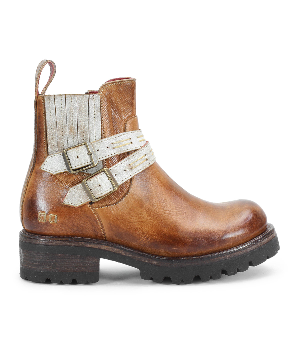 The Daring ankle boots by Bed Stu feature brown leather, rugged soles, two white adjustable buckle straps with metallic accents, a stacked heel, and a rear pull tab.