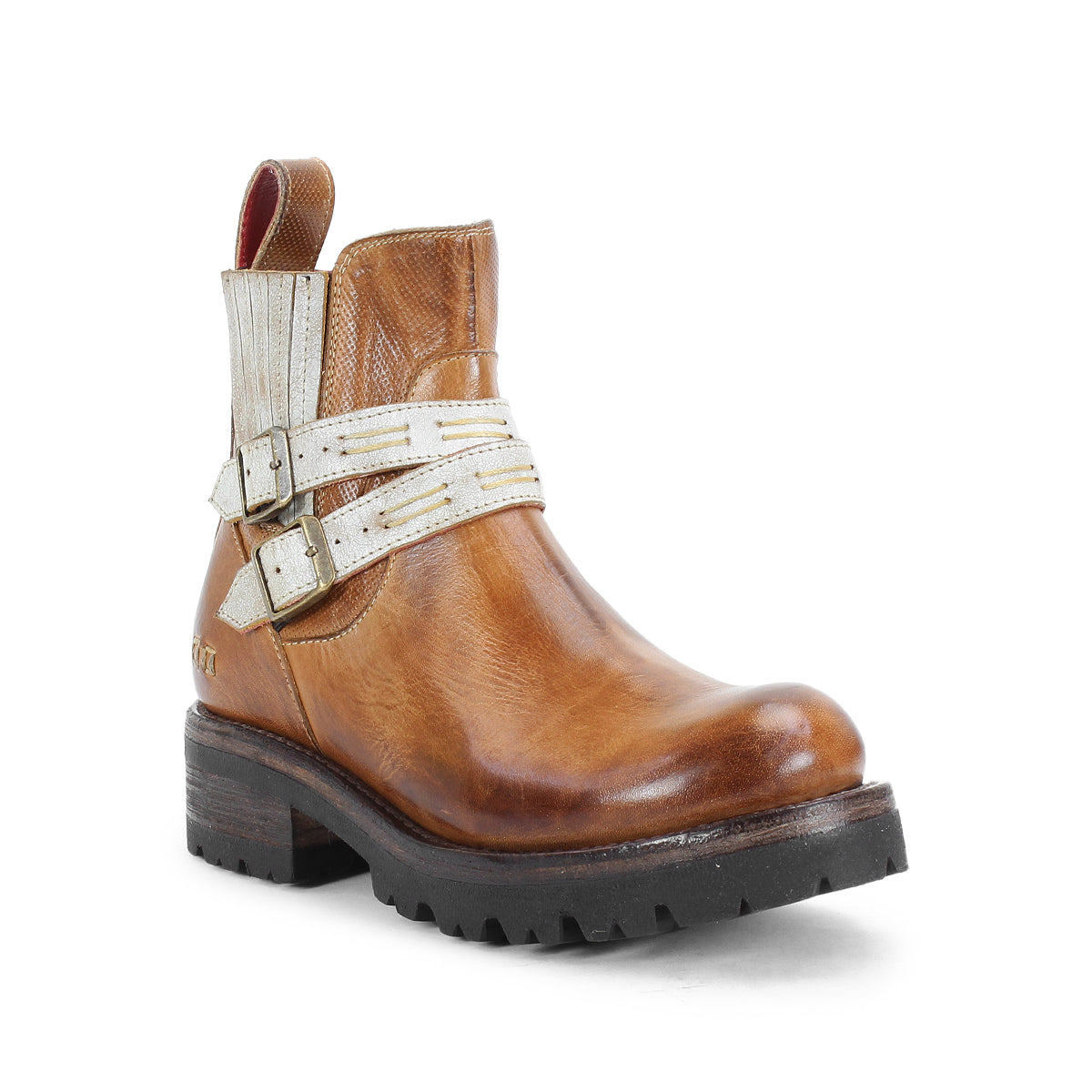 The Bed Stu Daring boots are brown leather ankle boots with a thick black sole and white adjustable buckle straps, offering a rugged style.